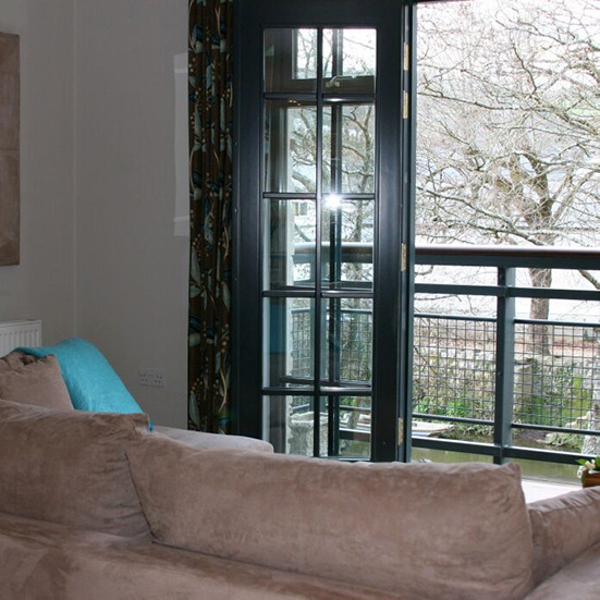 Sofa in The Moorings, a luxury holiday cottage for rent in Lostwithiel Cornwall